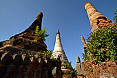 Inle Lake Myanmar. Indein, a cluster of ancient stupas  ruined and overgrown with bushes, just behind the village. 